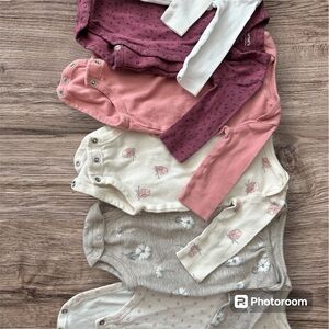 Bundle of seven baby onesies size 3 months